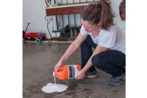 Lady using Oil and Stain remover